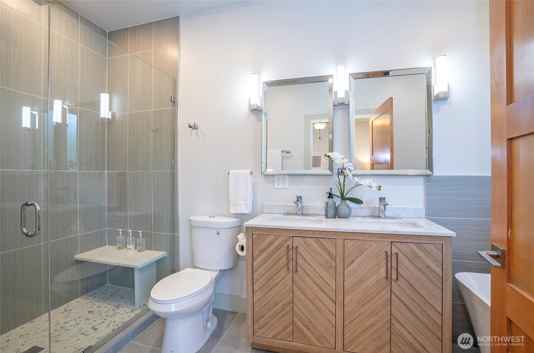 240 East Susan Lane Union, WA 98592 - Photo 20 of 40 a bathroom with a sink toilet a mirror and shower
