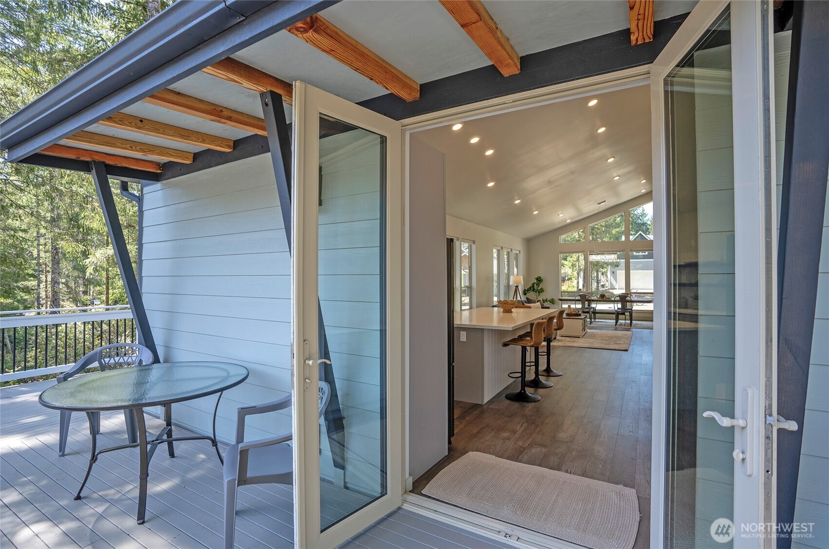 240 East Susan Lane Union, WA 98592 - Photo 30 of 40 a view of a porch with chairs and backyard