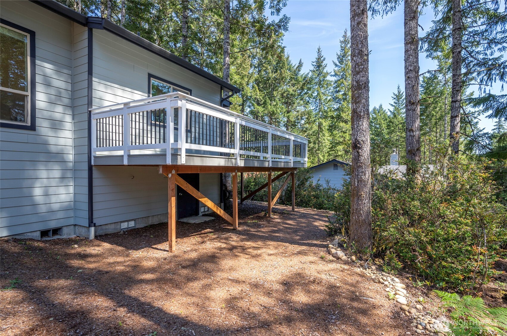 240 East Susan Lane Union, WA 98592 - Photo 34 of 40 a view of a house with a yard