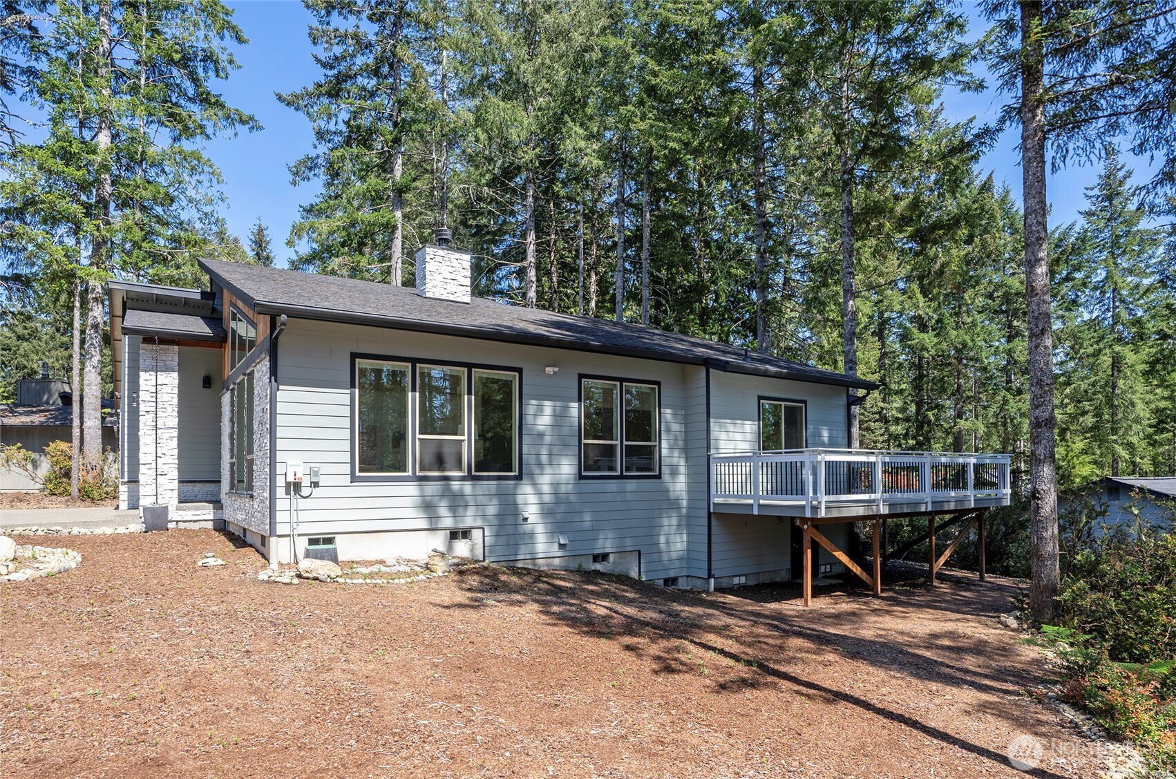 240 East Susan Lane Union, WA 98592 - Photo 35 of 40 a front view of a house with yard