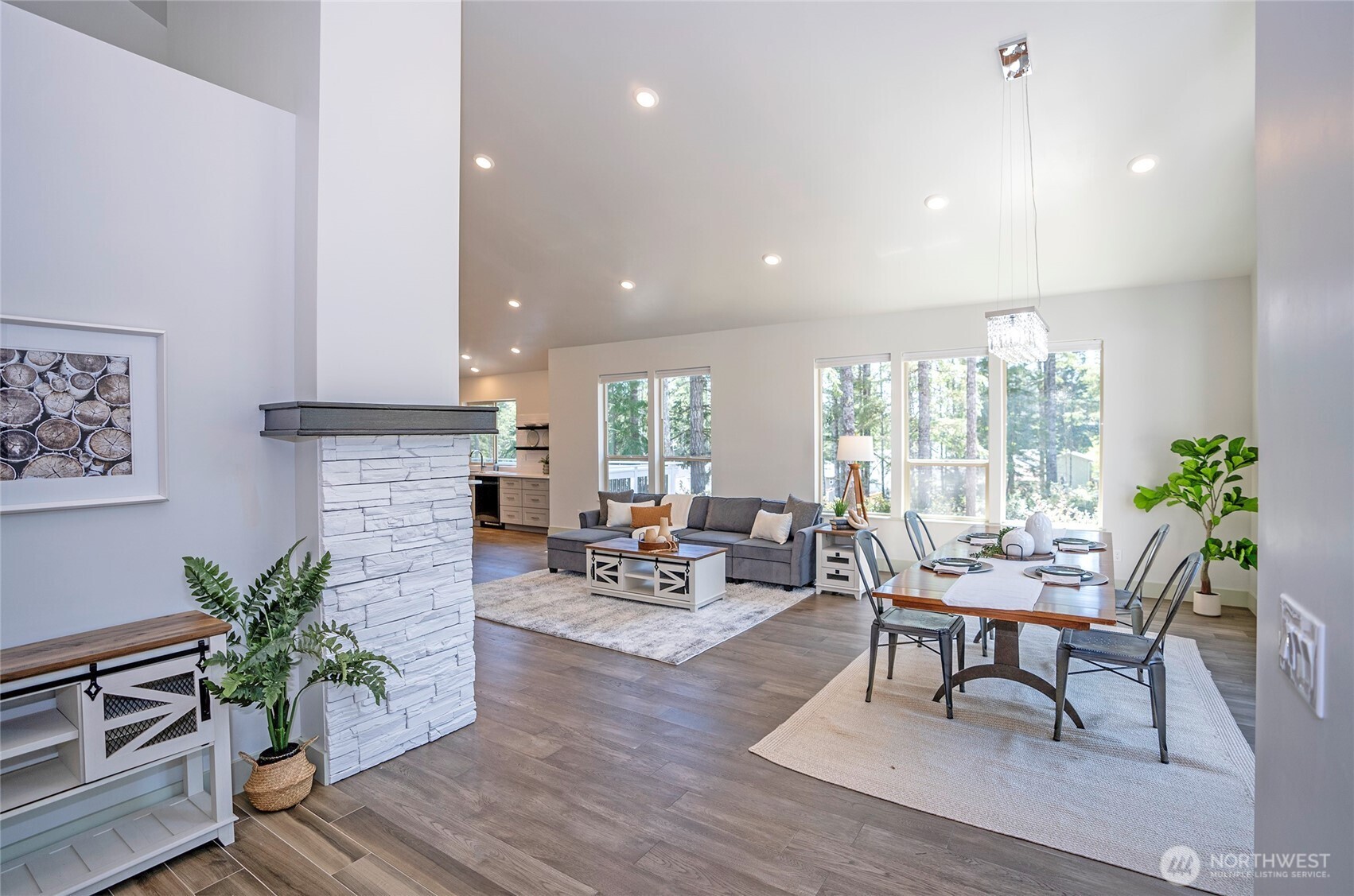 240 East Susan Lane Union, WA 98592 - Photo 5 of 40 a living room with furniture a potted plant and open kitchen view