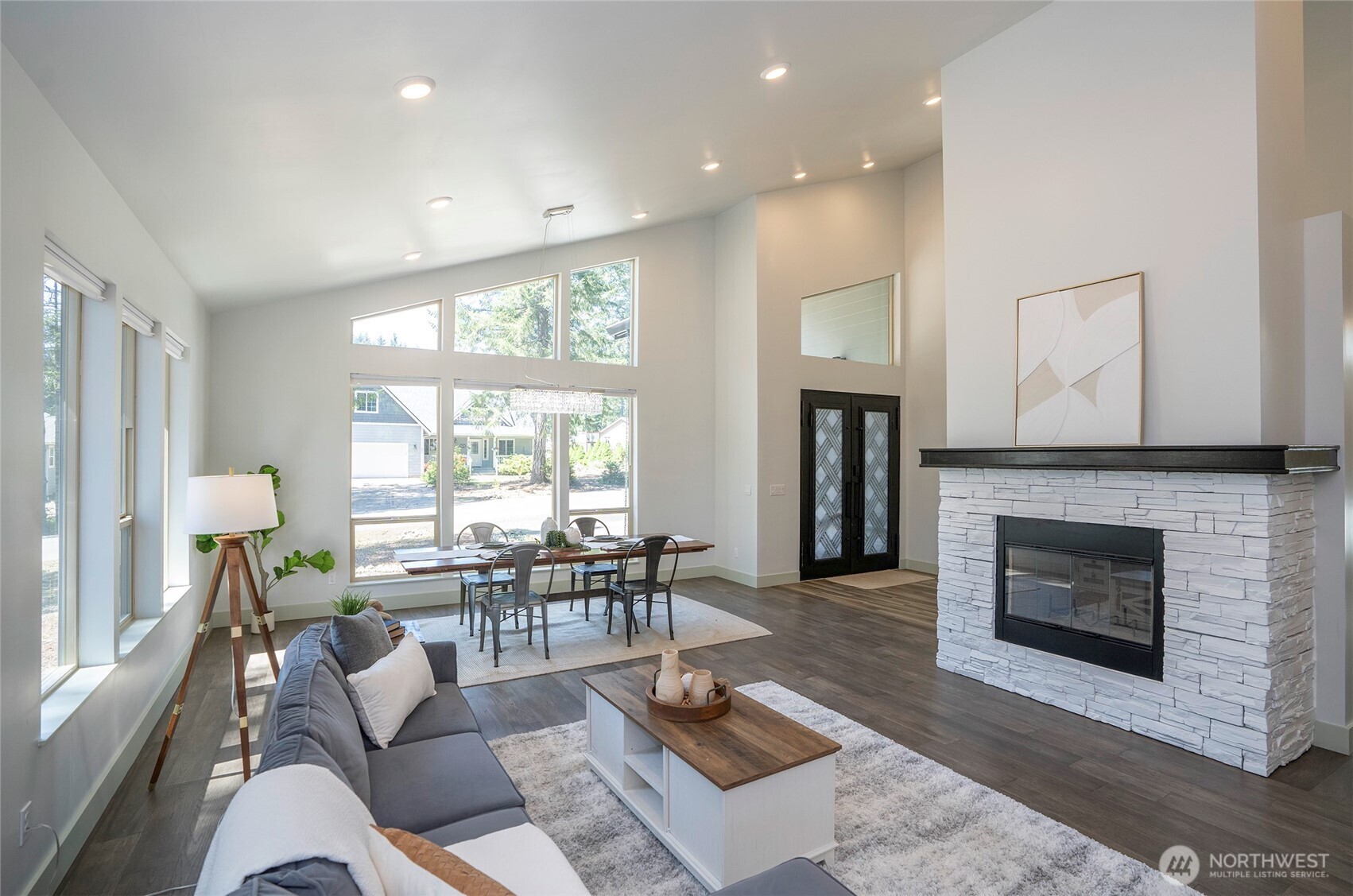 240 East Susan Lane Union, WA 98592 - Photo 6 of 40 a living room with furniture a window and a fireplace