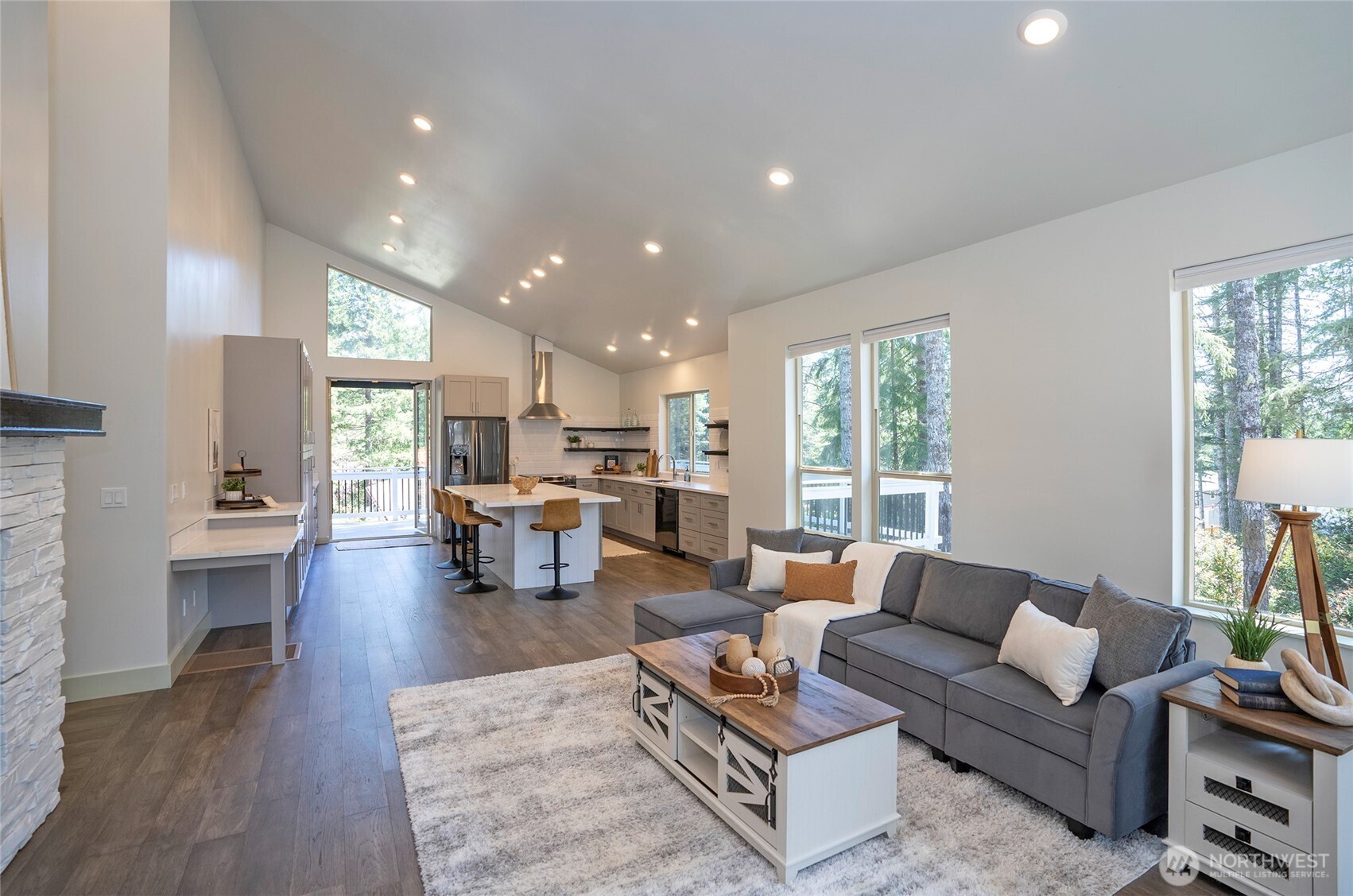 240 East Susan Lane Union, WA 98592 - Photo 7 of 40 a living room with furniture kitchen view and a large window