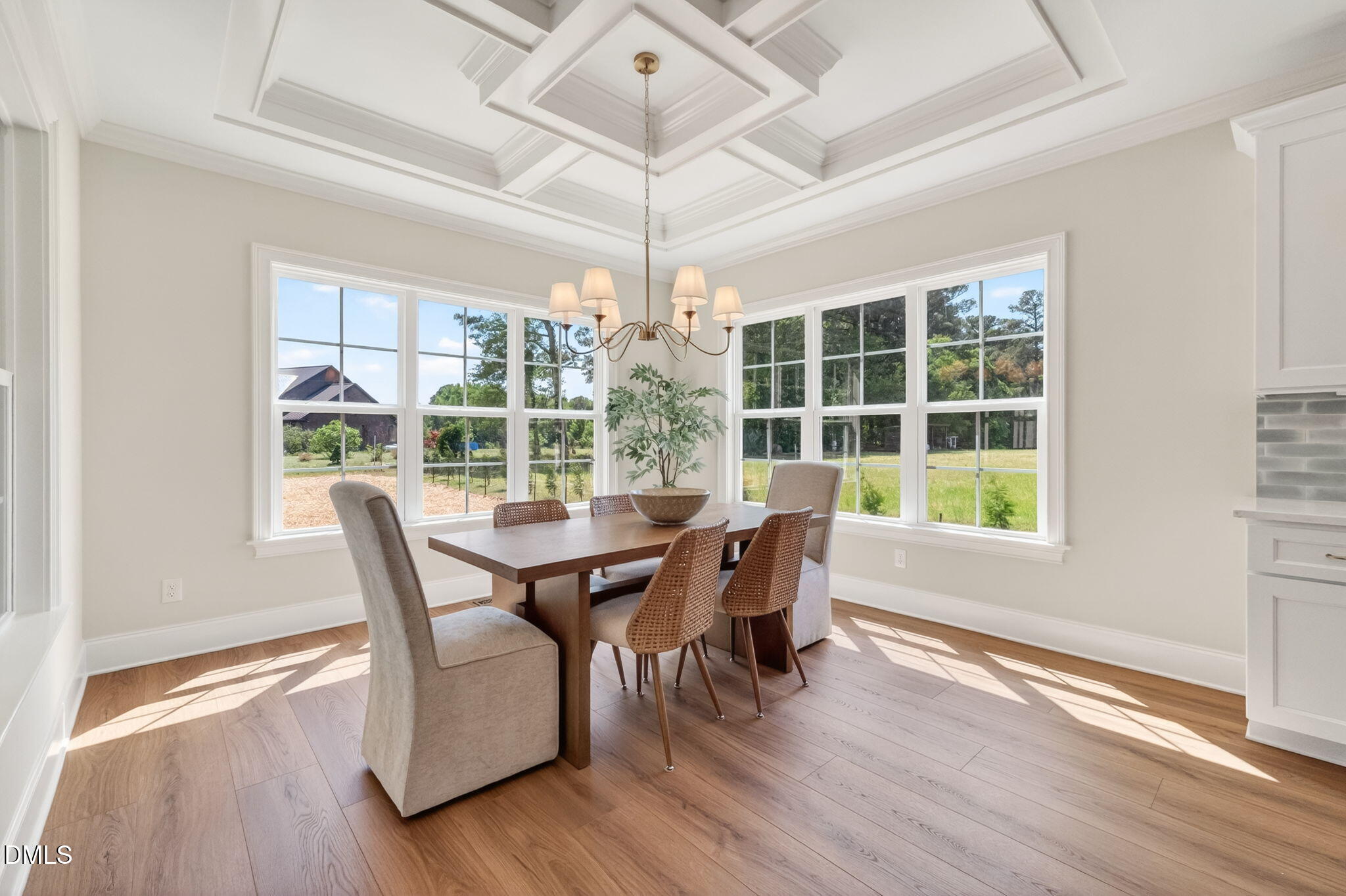 651 Dixon Road, Unit (LOT 2A) Willow Spring, NC 27592 - Photo 32 of 77 a view of a dining room with furniture and wooden floor