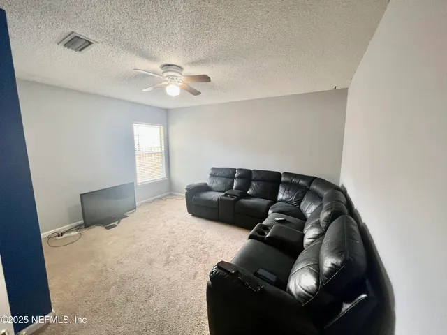 a bathroom with a sink toilet and mirror