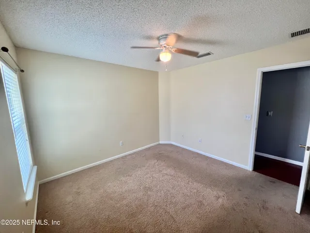 a view of a backyard with a garden