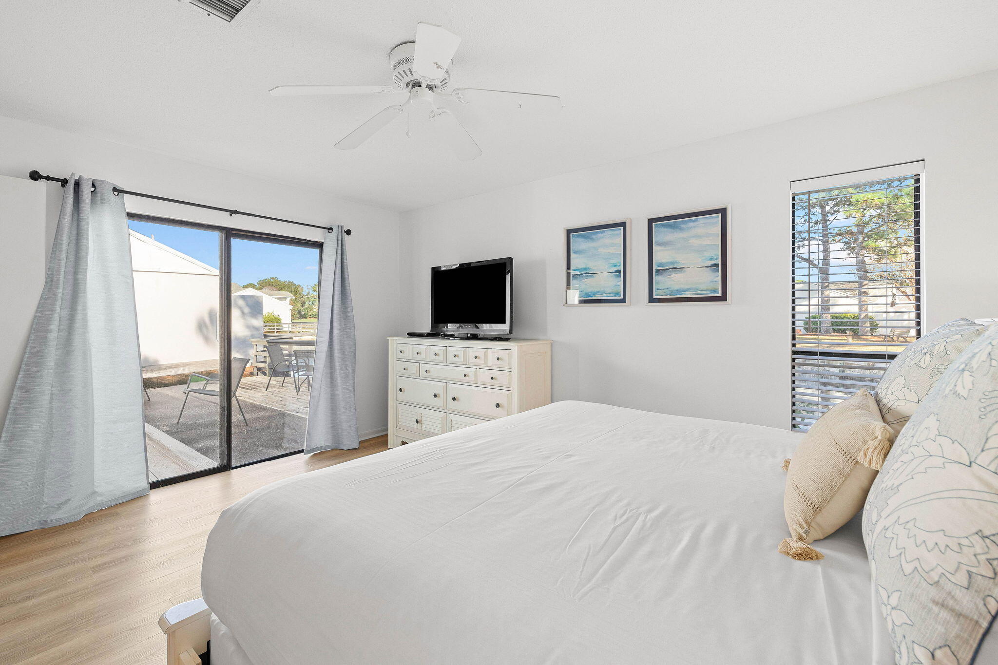 439 Linkside Circle Miramar Beach, FL 32550 - Photo 11 of 22 a bedroom with a large bed and a flat tv screen