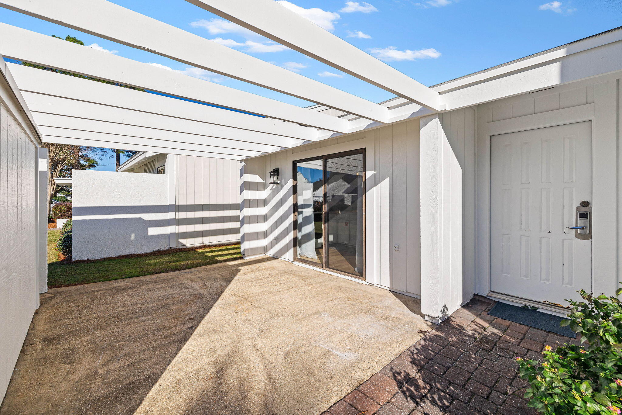 439 Linkside Circle Miramar Beach, FL 32550 - Photo 18 of 22 a view of a hallway and closet with wooden floor