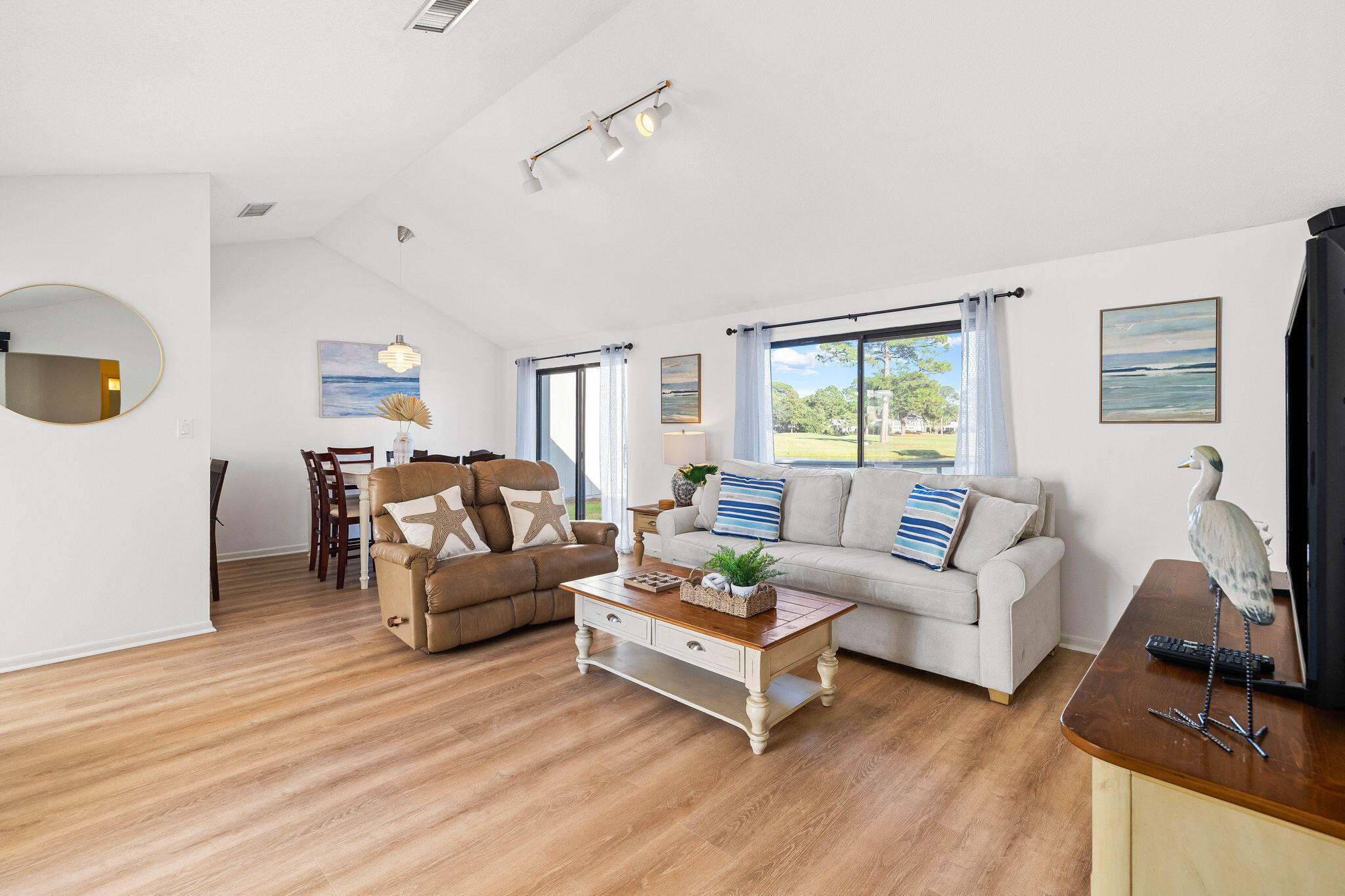 439 Linkside Circle Miramar Beach, FL 32550 - Photo 4 of 22 a living room with furniture and a flat screen tv