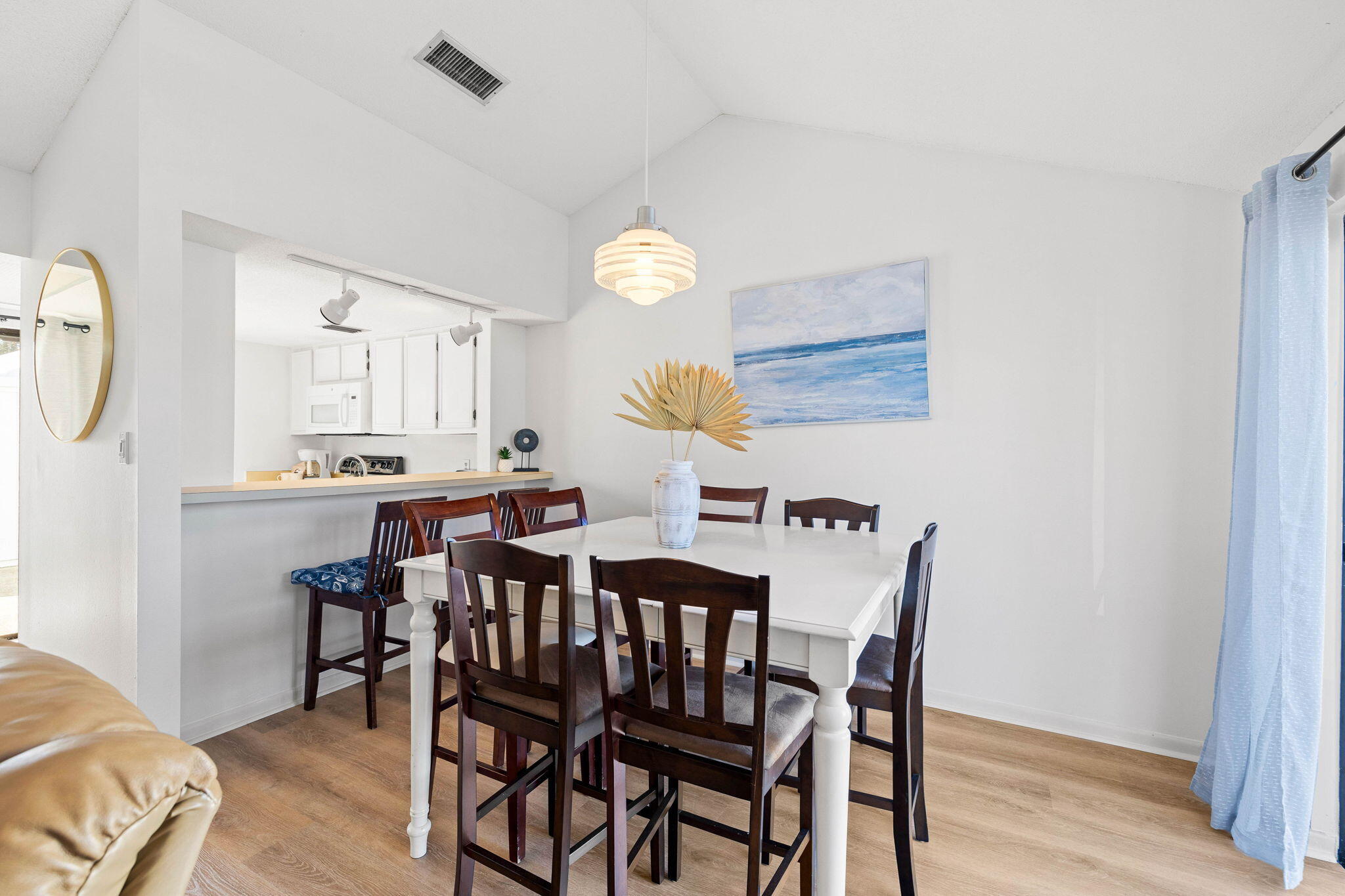 439 Linkside Circle Miramar Beach, FL 32550 - Photo 6 of 22 a view of a dining room with furniture and wooden floor
