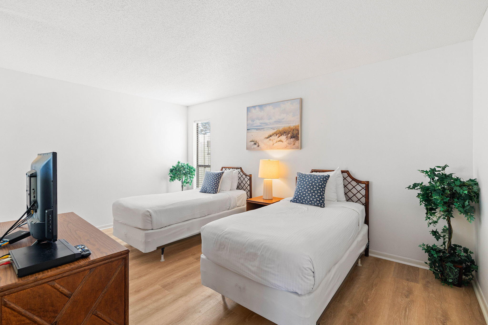 439 Linkside Circle Miramar Beach, FL 32550 - Photo 8 of 22 a bedroom with two beds and a potted plant