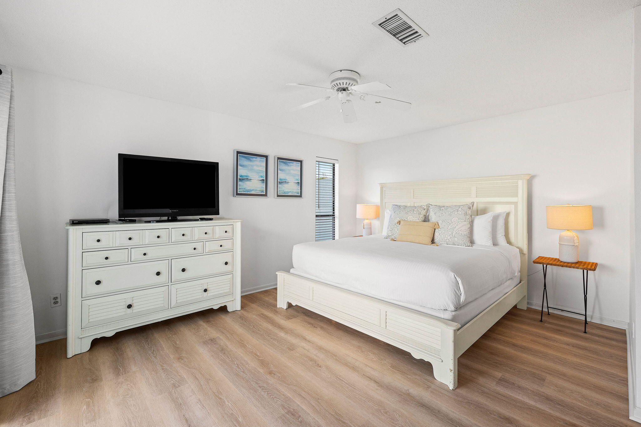 439 Linkside Circle Miramar Beach, FL 32550 - Photo 10 of 22 a bedroom with a bed and a flat screen tv