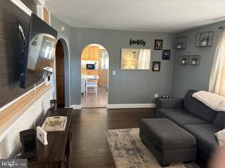 920 3rd Avenue Croydon, PA 19021 - Photo 3 of 12 a living room with furniture and a flat screen tv