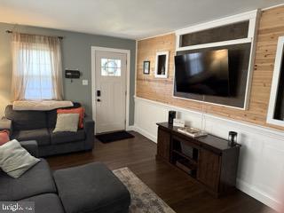 920 3rd Avenue Croydon, PA 19021 - Photo 4 of 12 a living room with furniture and a flat screen tv