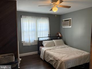 920 3rd Avenue Croydon, PA 19021 - Photo 8 of 12 a bedroom with a bed and a chandelier