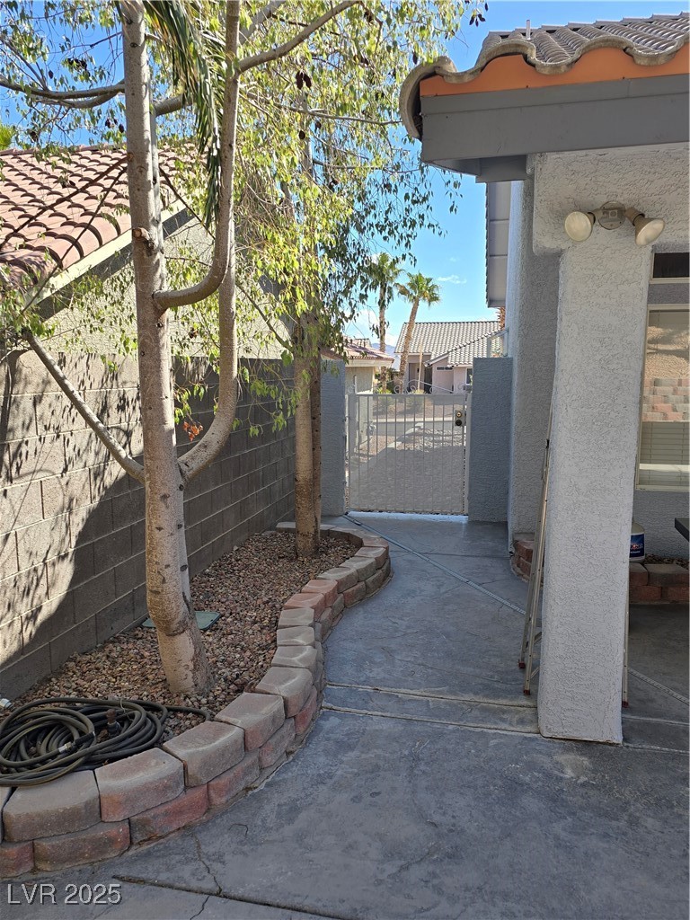 853 Rusty Anchor Way Henderson, NV 89002 - Photo 44 of 76 View of gate featuring fence