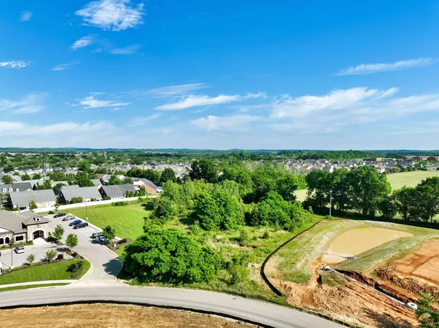 a view of swimming pool from a balcony