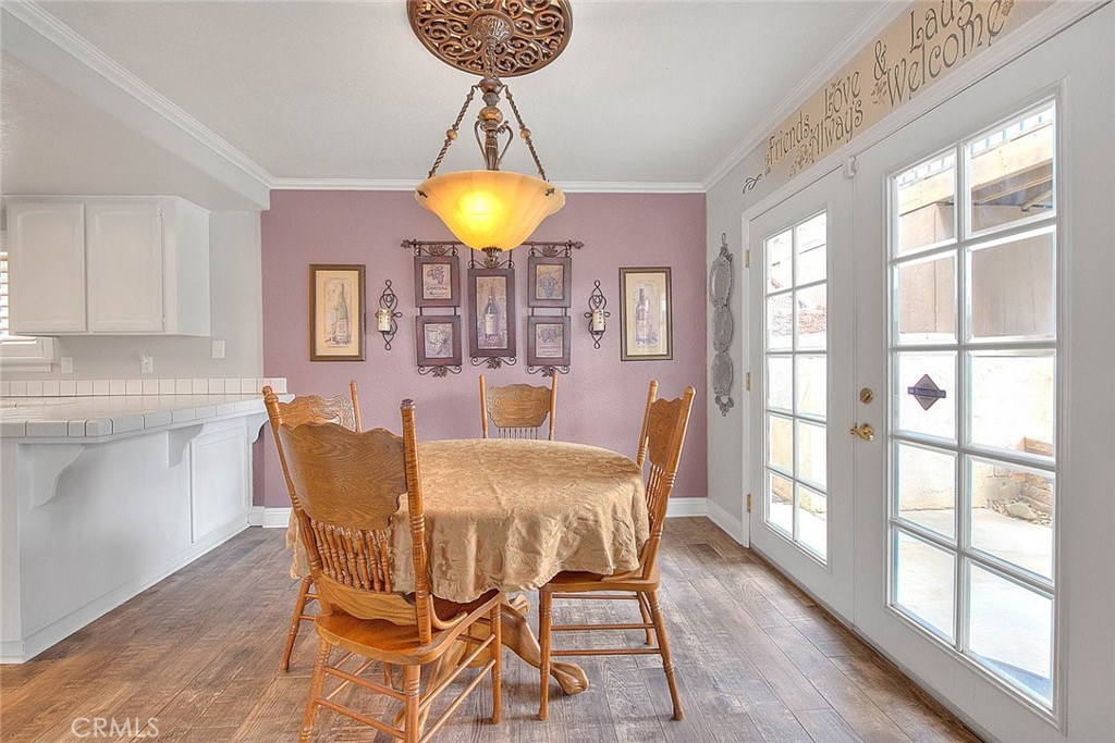 14452 Harvey Lane Riverside, CA 92503 - Photo 17 of 50 a view of a dining room with furniture and chandelier