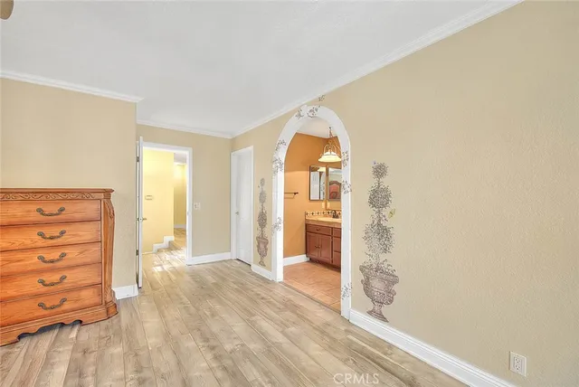 aerial view of a house with garden space and swimming pool