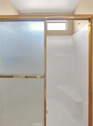 a view of a backyard with sitting area