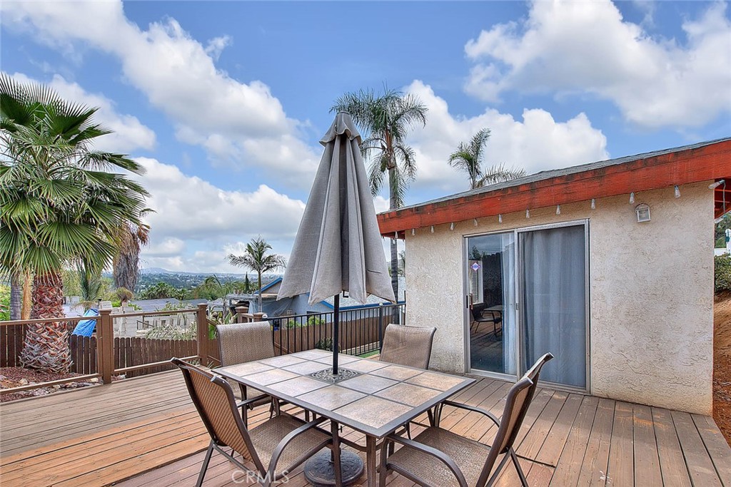 14452 Harvey Lane Riverside, CA 92503 - Photo 30 of 50 a view of a dinning table and chairs in patio of the house