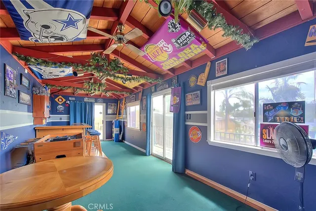 an aerial view of a house with yard swimming pool and outdoor seating