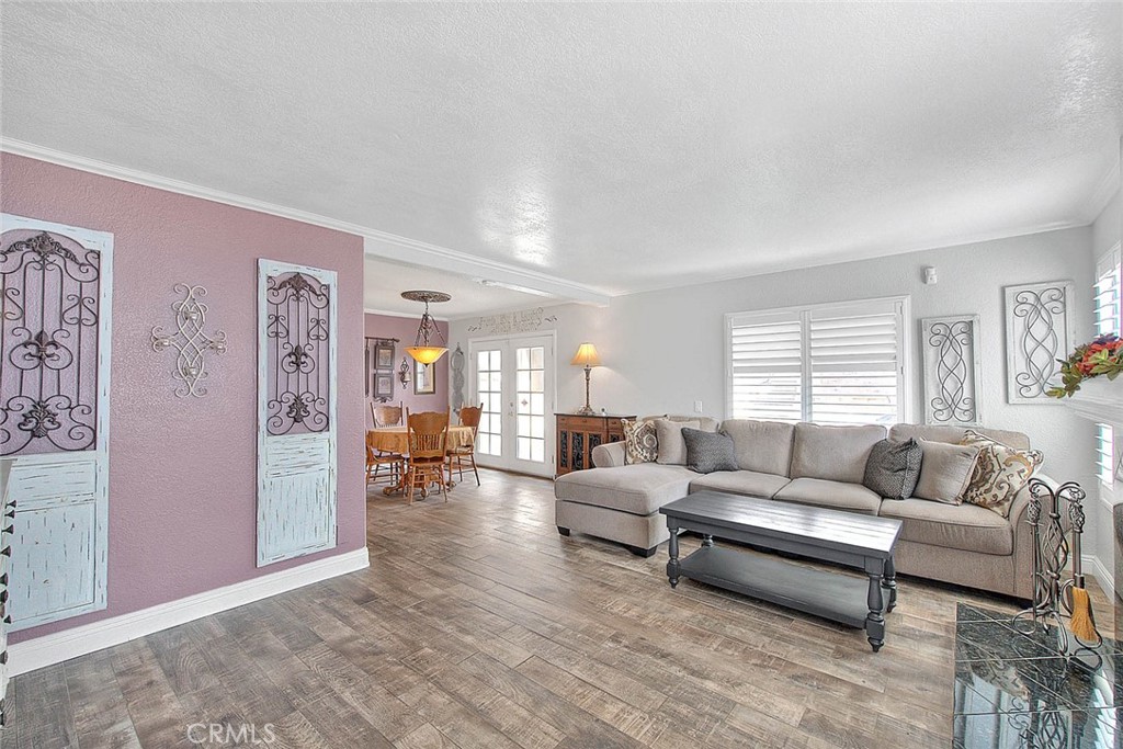 14452 Harvey Lane Riverside, CA 92503 - Photo 7 of 50 a living room with furniture and wooden floor