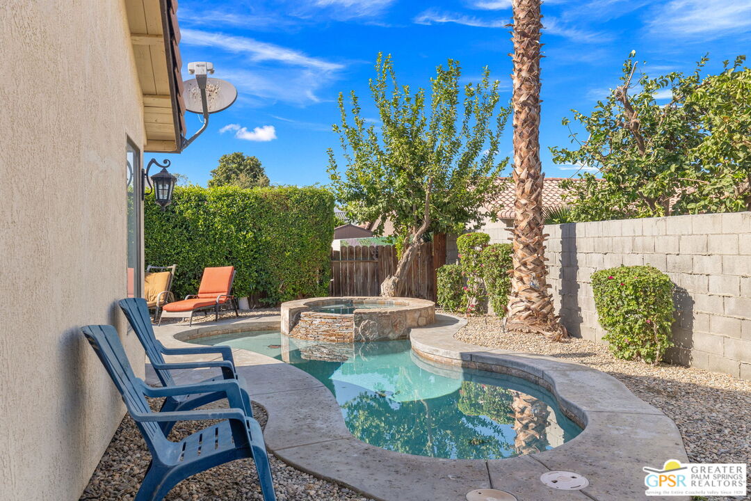 45688 Sutter Creek Road Indio, CA 92201 - Photo 39 of 51 a view of a house with backyard and sitting area