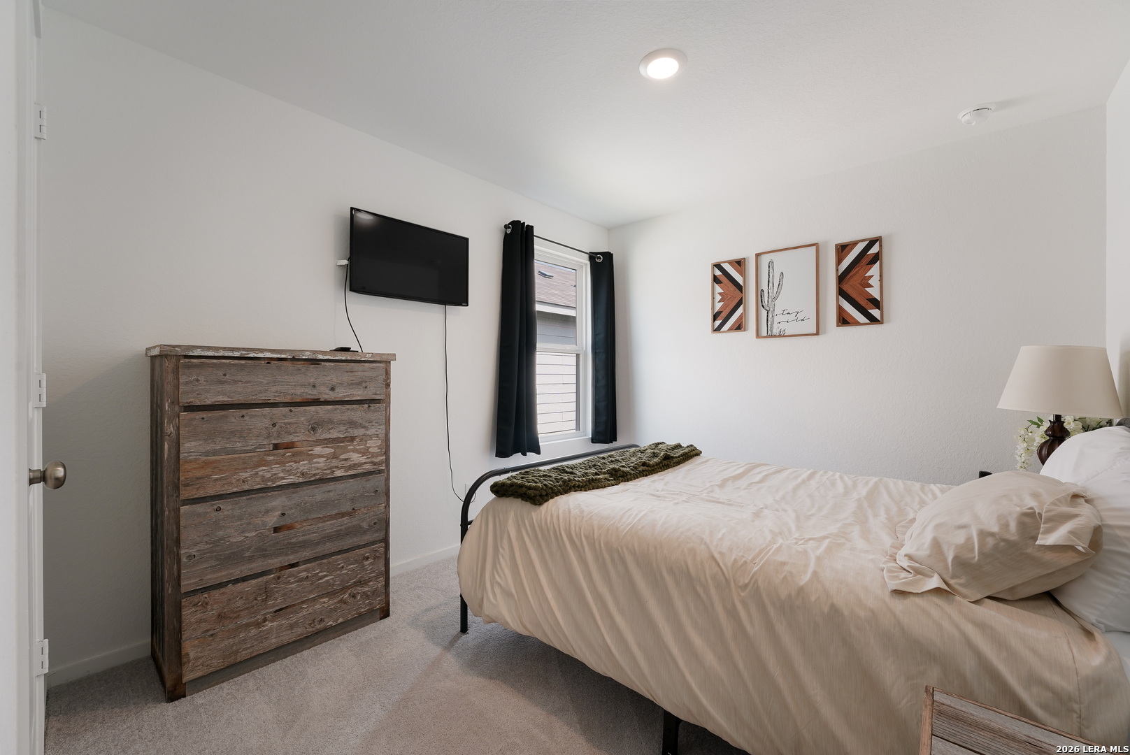 13012 Hancock Pool St. Hedwig, TX 78152 - Photo 23 of 32 a bedroom with a bed and a television