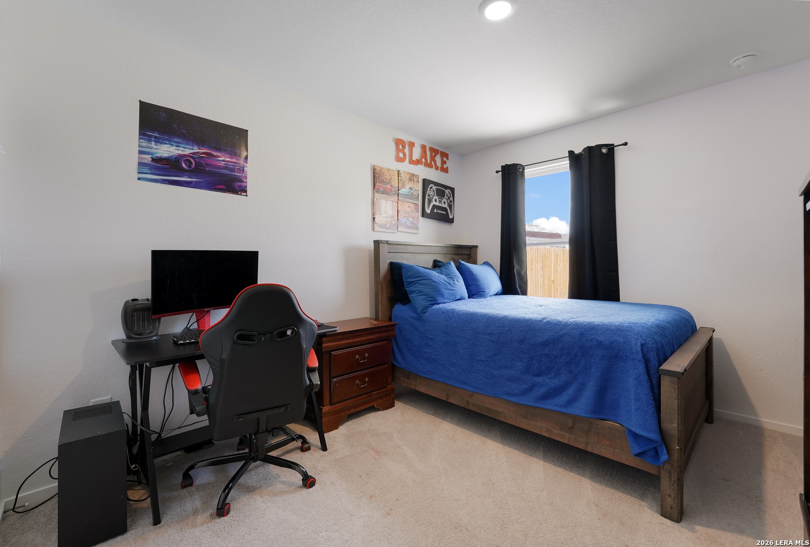 13012 Hancock Pool St. Hedwig, TX 78152 - Photo 25 of 32 a bedroom with a bed and a desk in it