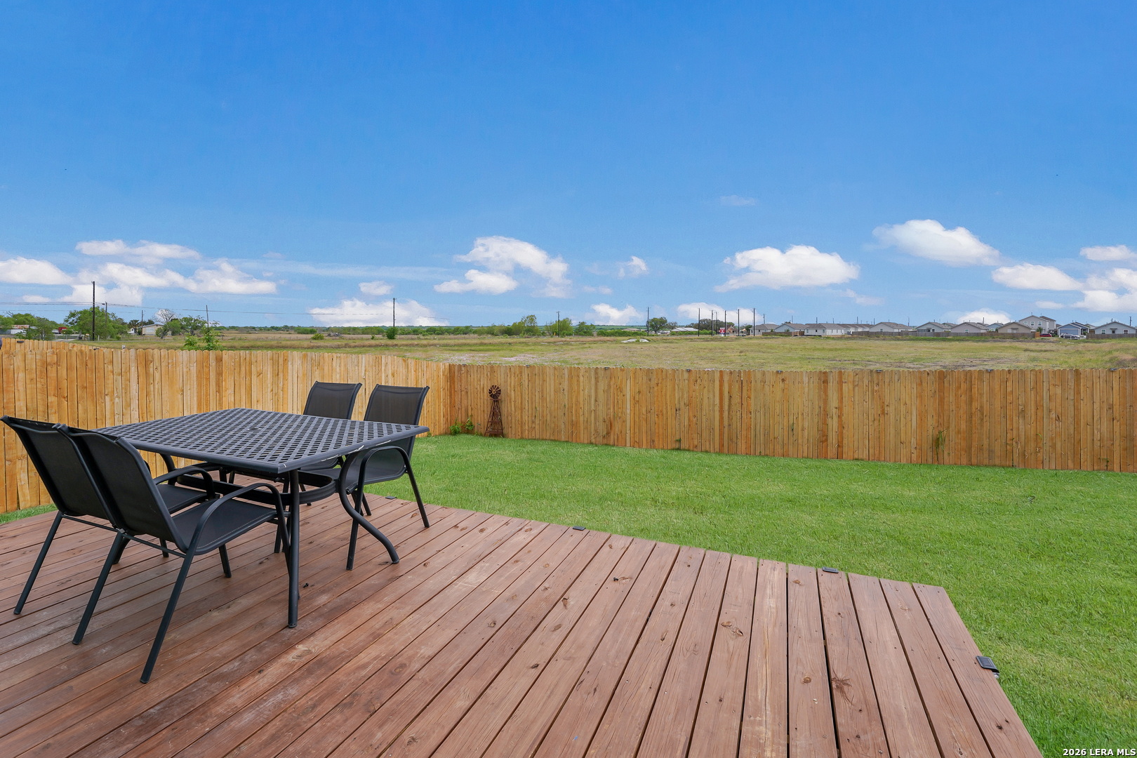 13012 Hancock Pool St. Hedwig, TX 78152 - Photo 29 of 32 a view of a lake with table and chairs
