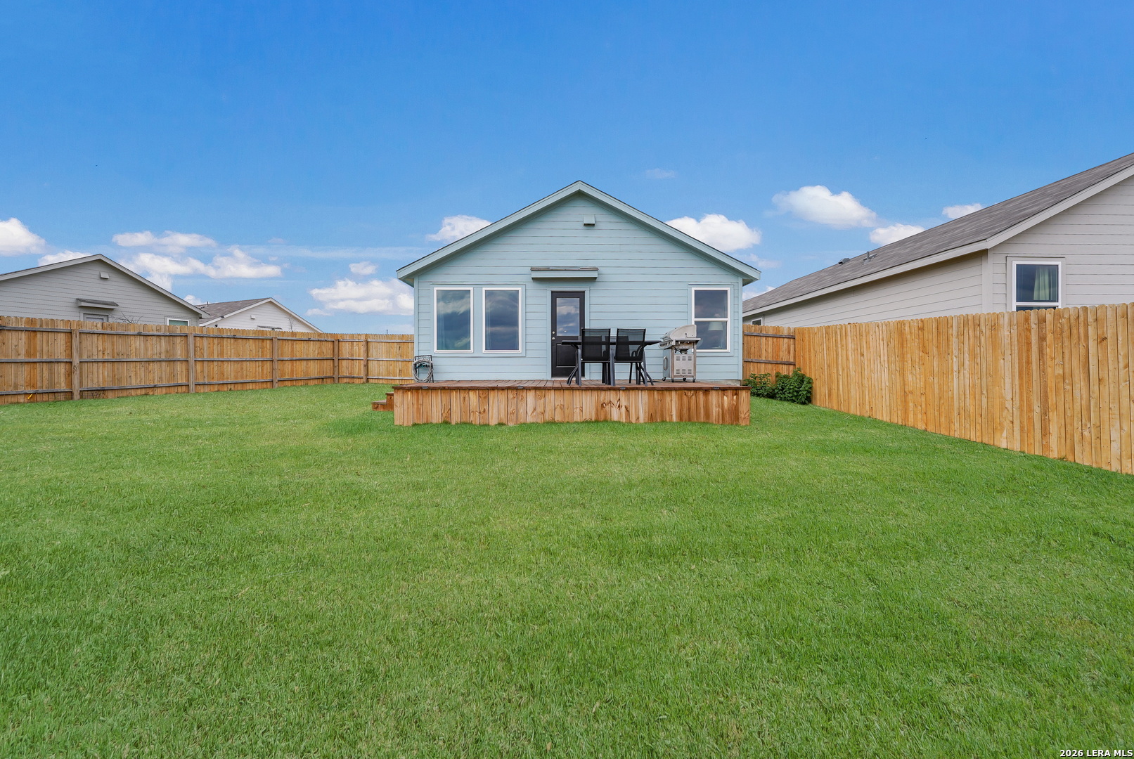 13012 Hancock Pool St. Hedwig, TX 78152 - Photo 31 of 32 a view of a house with a yard and sitting area