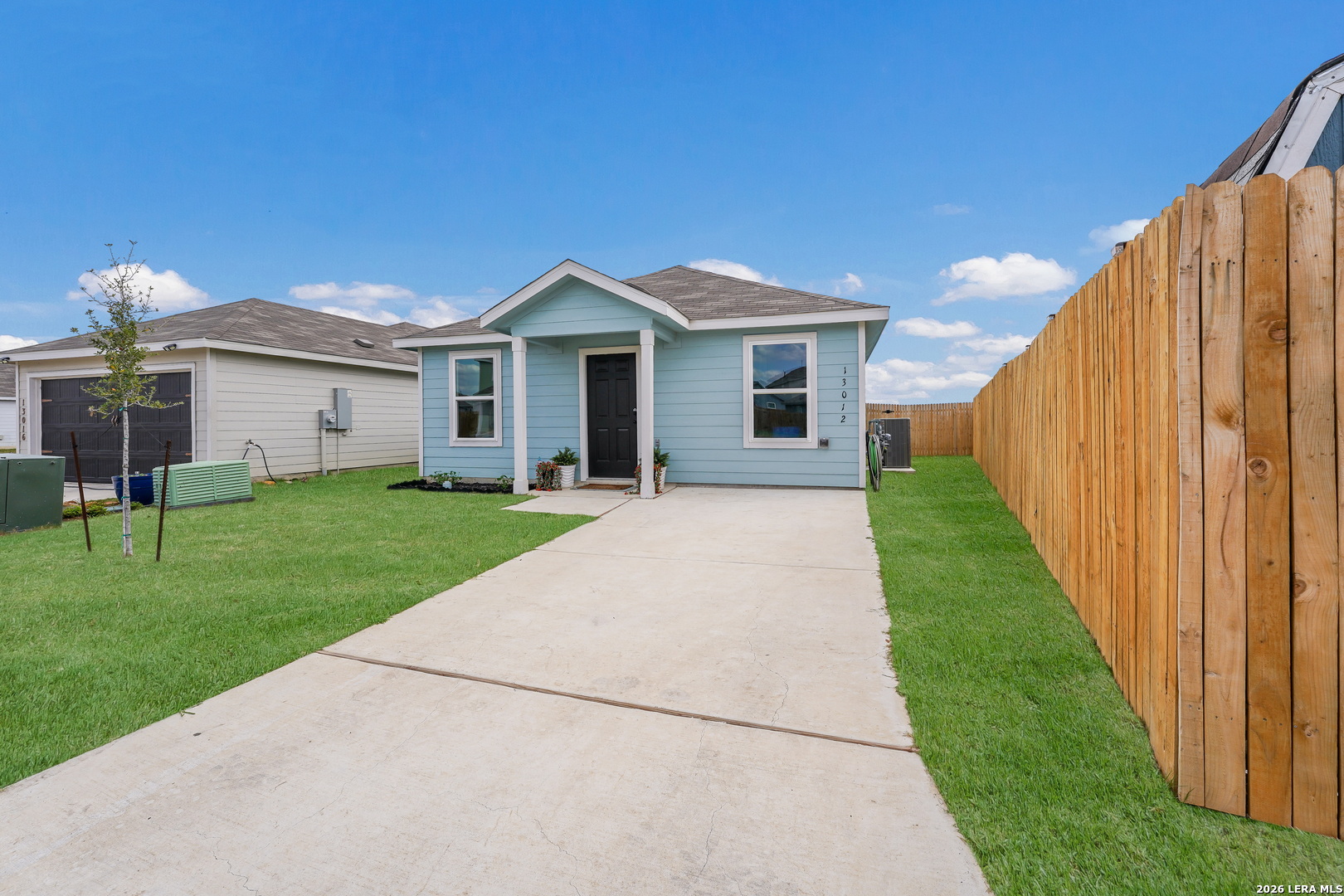13012 Hancock Pool St. Hedwig, TX 78152 - Photo 4 of 32 a view of a house with a yard