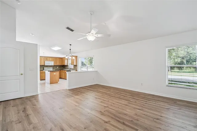 a view of kitchen with wooden floor