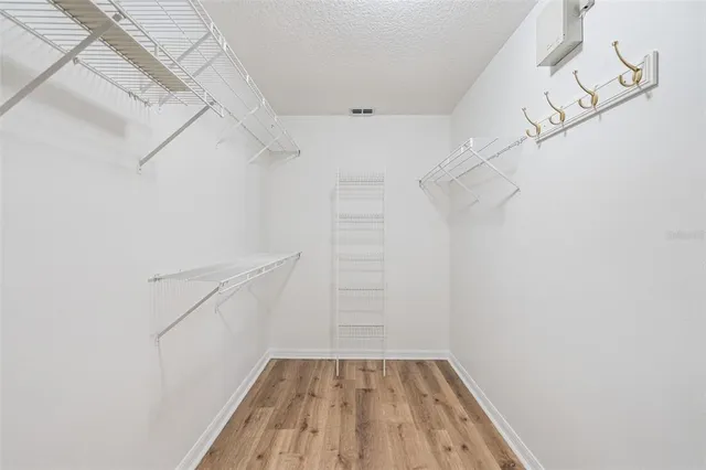 a view of a room with racks on the wall