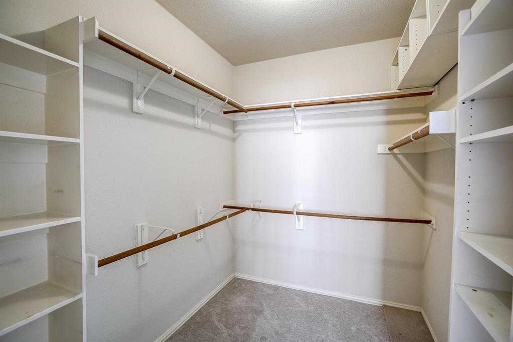 3604 Rams Horn Way Round Rock, TX 78665 - Photo 23 of 26 An organized walk-in closet with abundant storage and hanging space awaits.