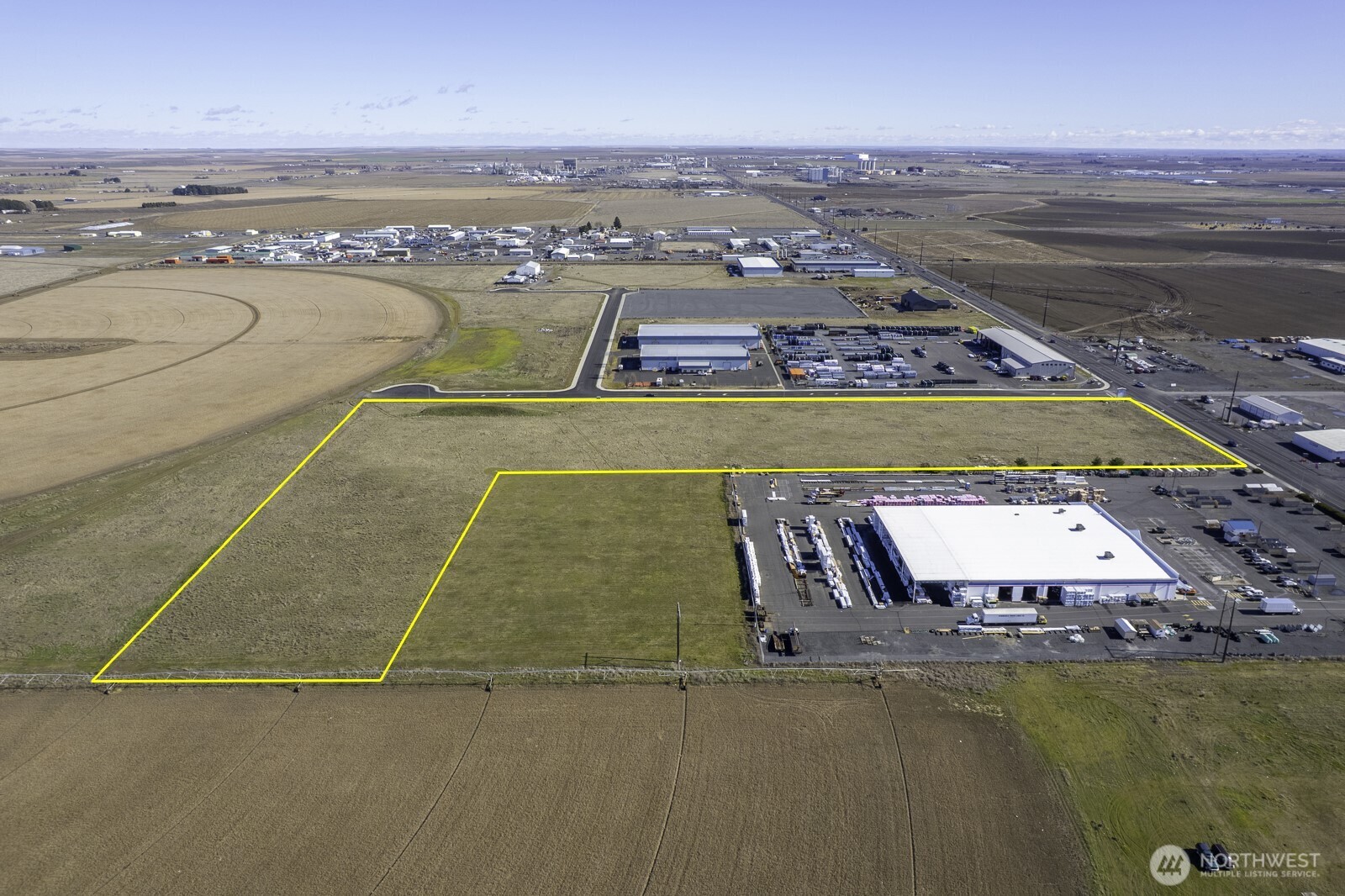 0 East Wheeler Road Moses Lake, WA 98837 - Photo 3 of 12 an aerial view of residential houses with outdoor space