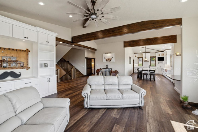 6117 North Rocky Ridge Road Peoa, UT 84061 - Photo 36 of 83 Living room with vaulted ceiling with beams, dark wood-type flooring, and ceiling fan