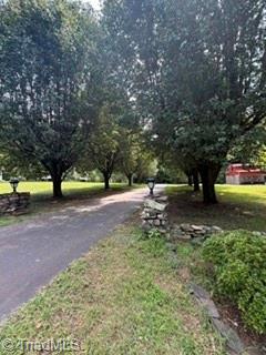 7620 Grapevine Road Lewisville, NC 27023 - Photo 5 of 49 Entry into driveway