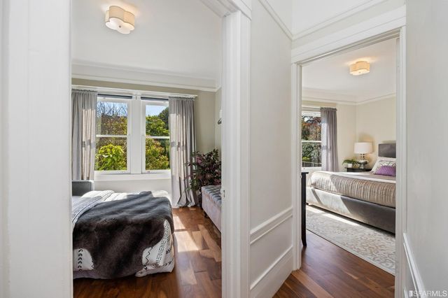 a bed room with a bed and a window