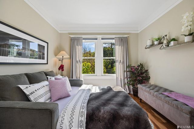 a bed room with a bed and a couch