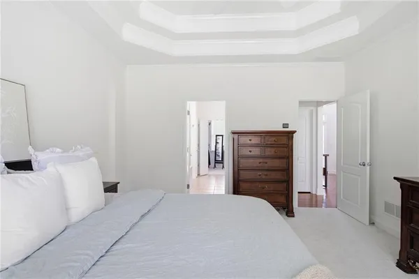 a bedroom with a bed and furniture