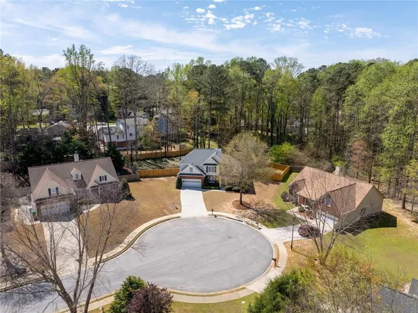 a view of a swimming pool with a patio