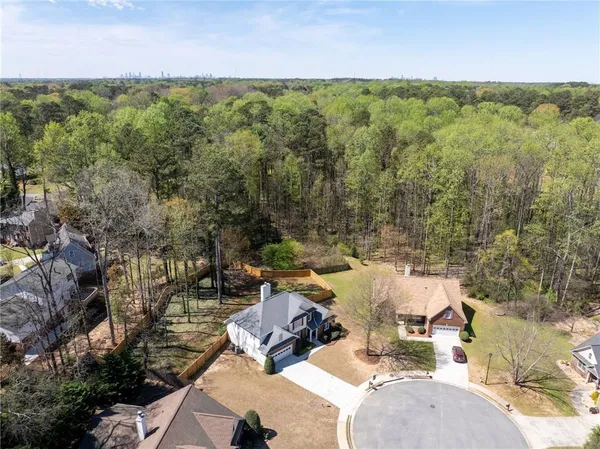 an aerial view of a house with lake view