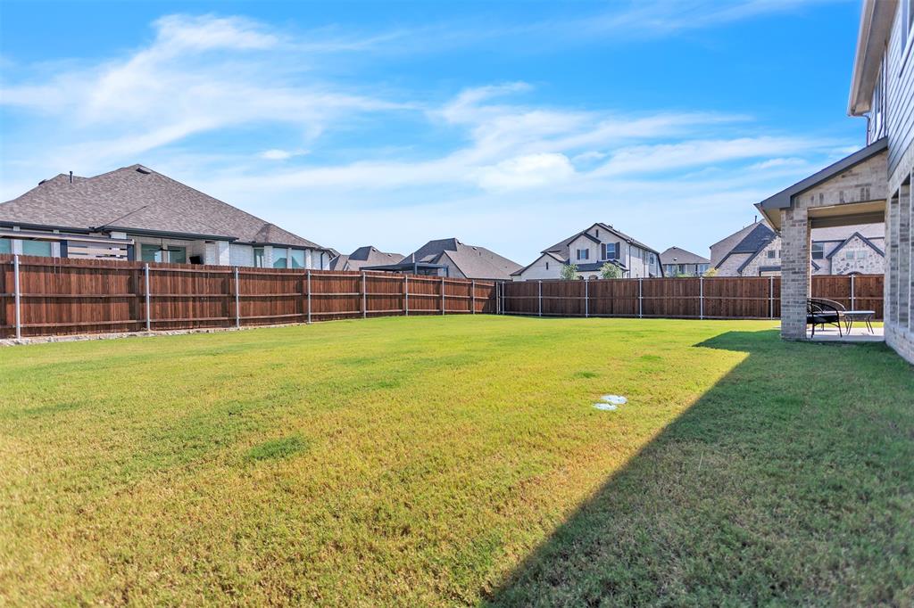 2311 Albion Way Forney, TX 75126 - Photo 2 of 30 a view of a garden with a small yard