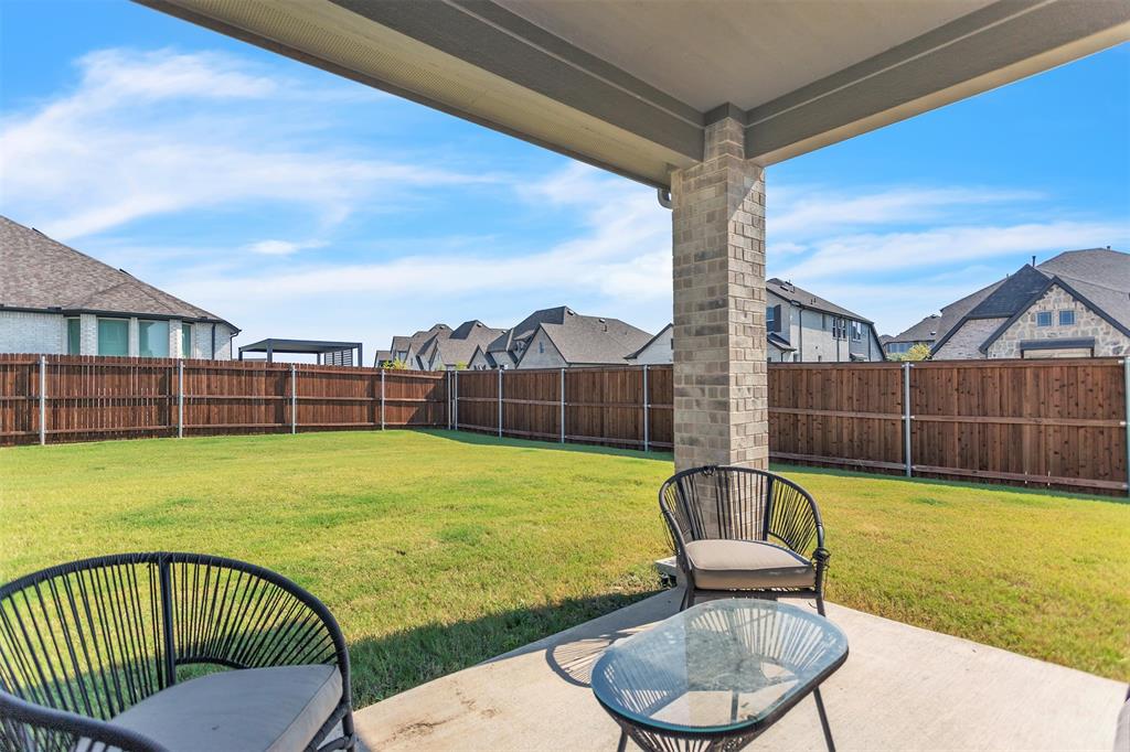 2311 Albion Way Forney, TX 75126 - Photo 25 of 30 a view of a swimming pool with a lounge chairs