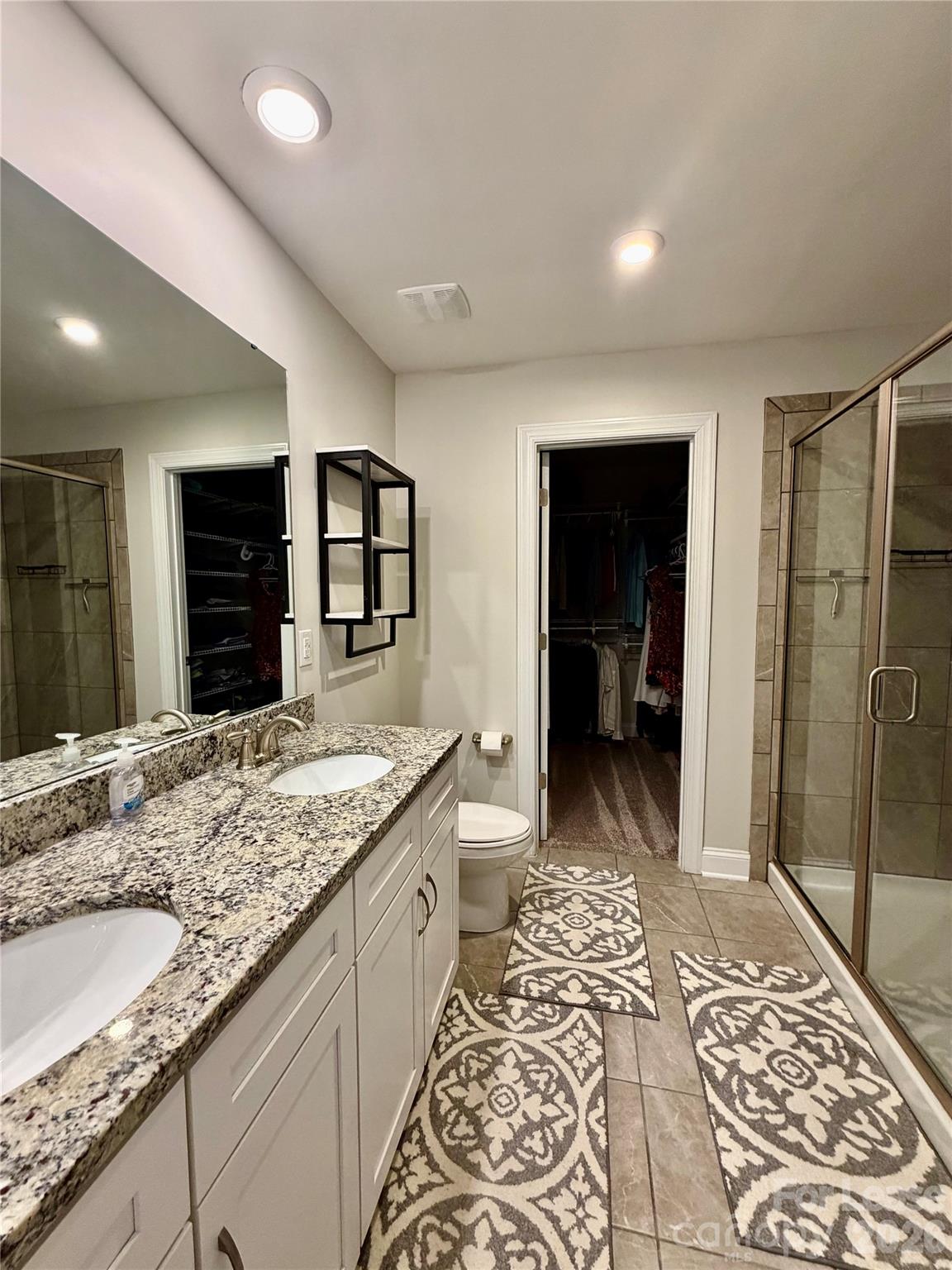 1220 Pecan Ridge Road Fort Mill, SC 29715 - Photo 12 of 25 a bathroom with a granite countertop sink and a mirror