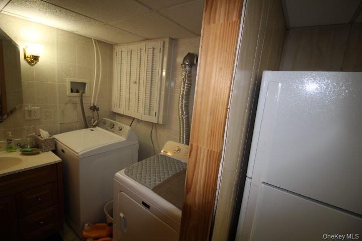 226 Goff Road, Unit 24 Livingston Manor, NY 12758 - Photo 31 of 49 a bathroom with a sink a toilet and mirror
