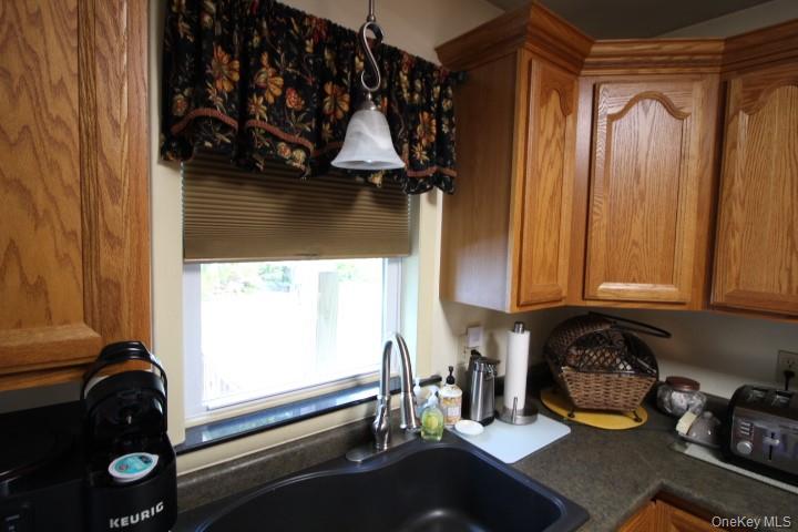 226 Goff Road, Unit 24 Livingston Manor, NY 12758 - Photo 45 of 49 a kitchen with a sink and a window