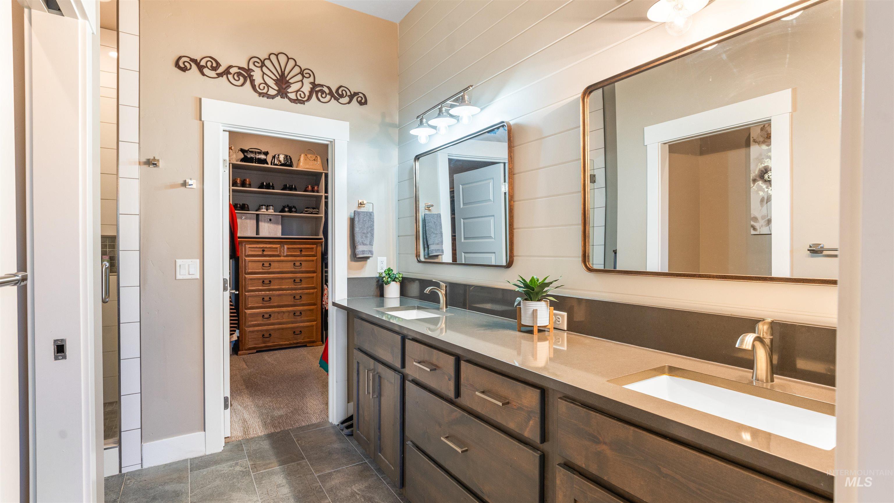 4676 South Abbot Meridian, ID 83642 - Photo 39 of 49 Bathroom featuring double vanity and a walk in closet
